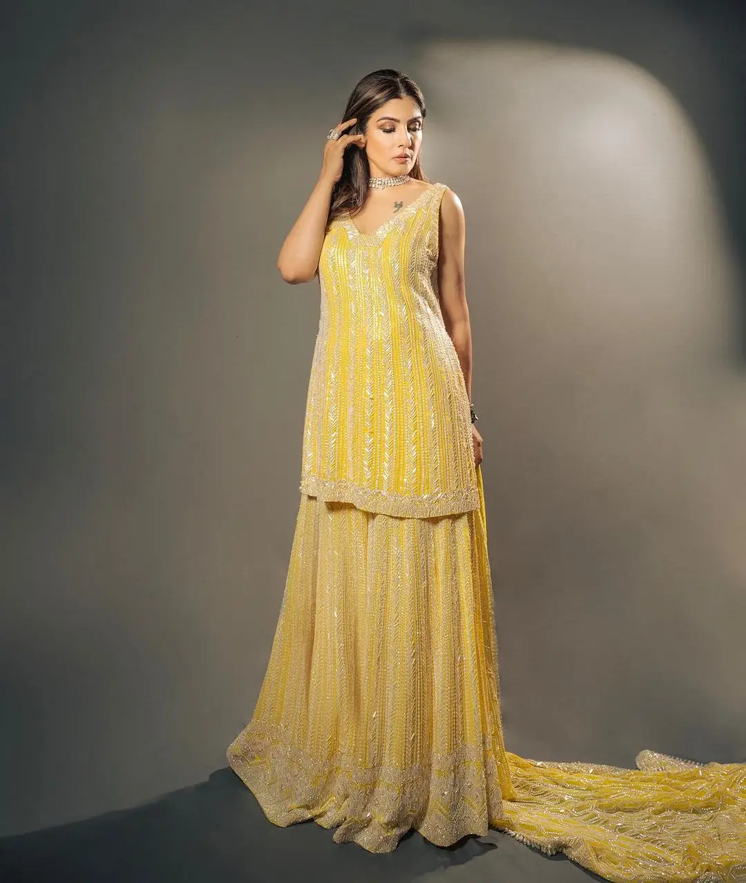 Raveena Tandon Wearing Beautiful Earring Yellow Gown